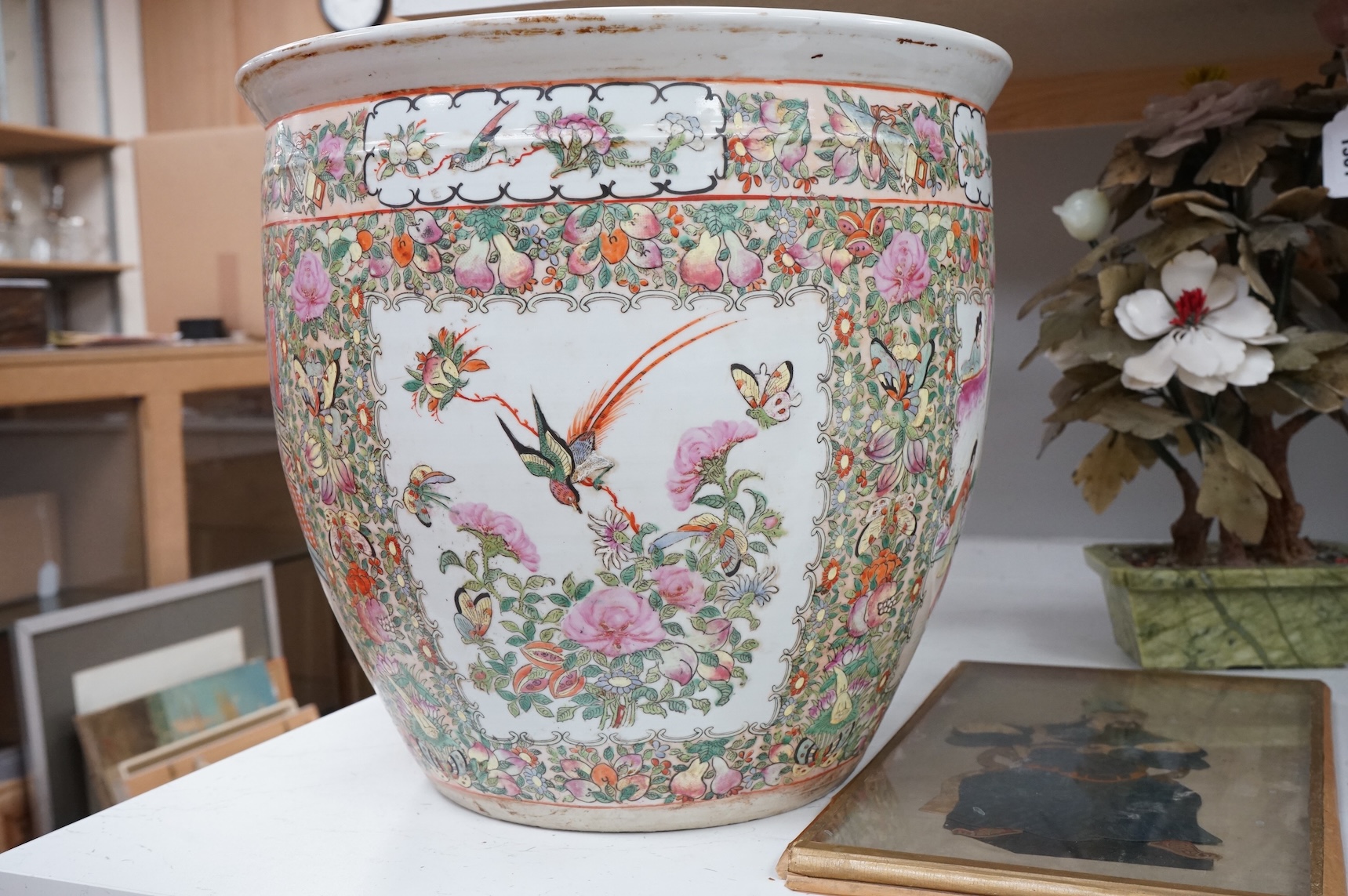 A Chinese famille Rose goldfish bowl enamelled with figures, butterflies and flowers, 41cm in diameter